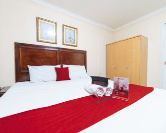 RedDoorz @ Clarkview 21st Street Angeles City - انغيليس سيتي - غرفة نوم