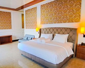 غيلي بيتشفرونت سويتس - Gili Trawangan - غرفة نوم