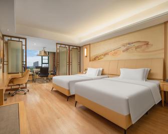 Yigu International Hotel - Ксіанфан - Спальня