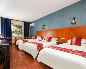 Chengdu Dreams-Travel Wenjun Mansion Hotel - צ'נגדו - חדר שינה