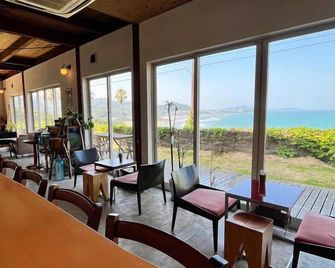 Guesthouse & Beach Cafe Fuego, Hostel - Hyuga - Restaurant