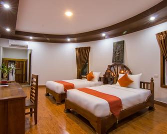 Ravorn Villa Boutique - Battambang - Schlafzimmer