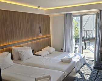 Hotel Carpe Diem - מוסטר - חדר שינה