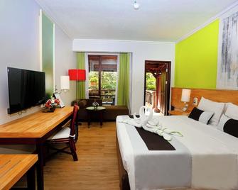 โรงแรมไพรม์พลาซ่า ซานูร์ - บาหลี - ผ่านการรับรอง CHSE - เดนปาซาร์ - ห้องนอน