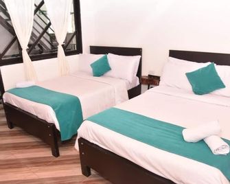 Hotel Samai - San Agustin - Спальня