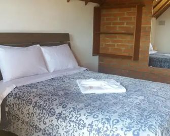 Pousada vista do Paraíso - Camanducaia - Habitación