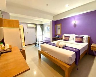 تشيندا بوتيك هوتل - شيانج ماي - غرفة نوم