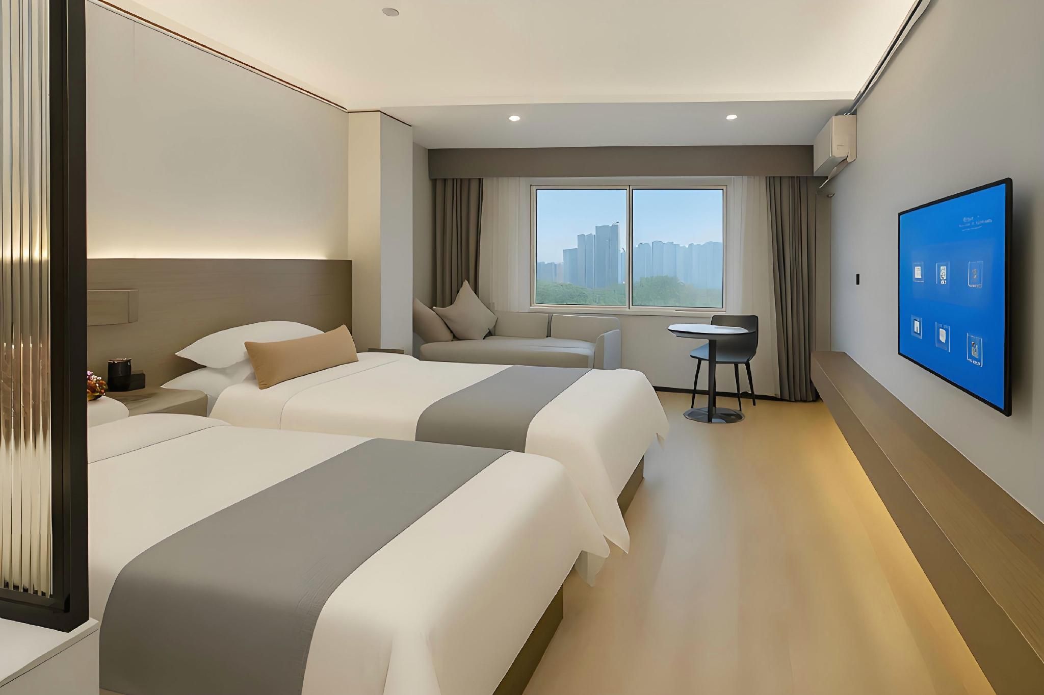 Hainan Tengpeng Hotel - هايكو - غرفة نوم