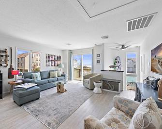 Beautiful Oceanfront Condo located on the beach with our own heated pool - Beach Haven - Living room