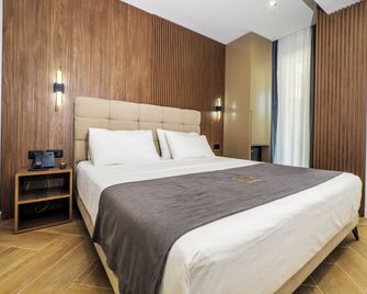 Es Hotel - Tirana - Phòng ngủ