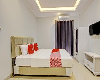 Hotel O Imperial Inn - Cilacap - Schlafzimmer