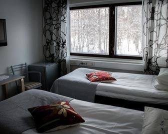 Hotelli Vuolake - Laukaa - Schlafzimmer