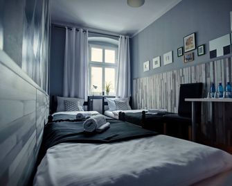 Explorer B&B Old Town Rooms & Apartment #don't be a tourist, be an Explorer! - פוזנאן - חדר שינה