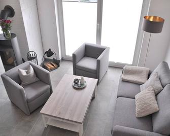 Spacious vacation home in a perfect location with fireplace, sauna, whirlpool - Nordhorn - Salon