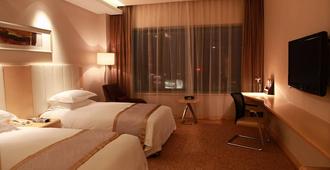Deefly Grand Hotel Airport Hangzhou - Hangzhou - Schlafzimmer