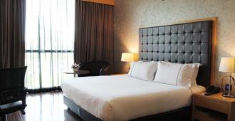 Symphony Suites Hotel - Ipoh - Schlafzimmer
