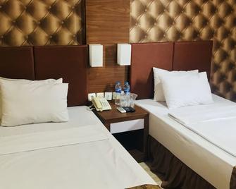 Palapa Hotel - Purwokerto - Bedroom