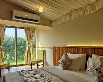 Nirvana Resort and Restaurant - Kevadia - Bedroom