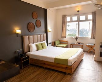 OYO 5034 Living Roof - Shillong - Slaapkamer