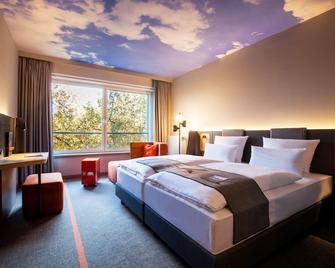 ATLANTIC Hotel Airport - Bremen - Bedroom
