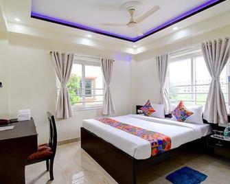 Fabhotel Anchorage Inn - Nr Axis Mall - Kolkata - Bedroom