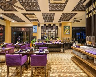 Royal Riverside Hoi An Hotel & Spa - הוי אן - מסעדה