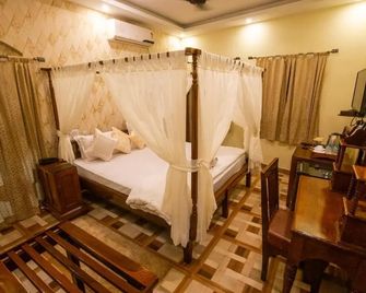 Hotel Cecil - Calcuta - Habitación