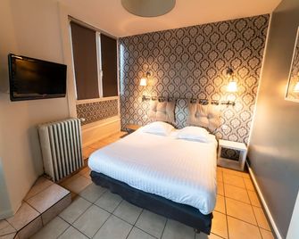 Citotel Furania - Saint-Étienne - Schlafzimmer