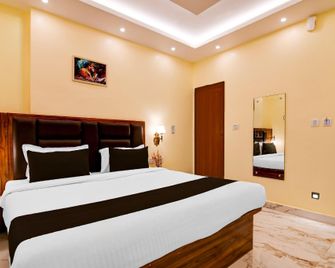 Super Townhouse Puri Sea Beach Formerly Shri Jagannath Homestay - Puri - Ložnice