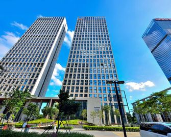 HeeFun Apartment GZ -Poly World Trading Center-walking distance to Canton Fair - Guangzhou - Building