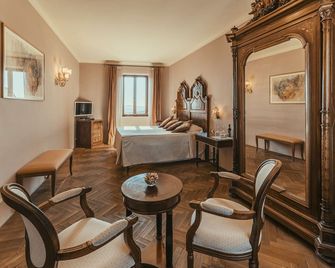 La Locanda di San Francesco - מונטפולצ'אנו - חדר שינה