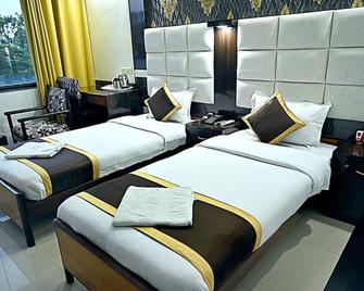 Hotel Rajhans International - Bhāgalpur - Bedroom