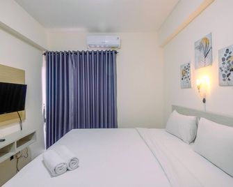 Homey Studio at Bogorienze Apartment near The Jungle Waterpark By Travelio - Bogor - Bedroom