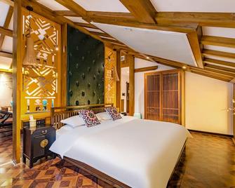 Secgarden Boutique Hotel - Zhangjiajie - Bedroom