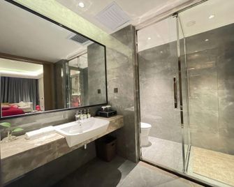 Baoji Saite Holiday Hotel - Baoji - Schlafzimmer