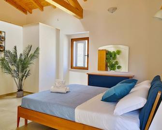 Dommos - Arcada Apartments - Orosei - Camera da letto
