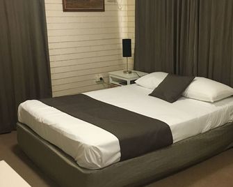 Mid City Motor Inn - Gladstone - Bedroom