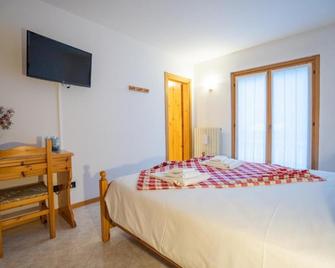 Fior di Roccia - Valmalenco - Hotel & Mountain Restaurant - Lanzada - Schlafzimmer