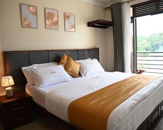 Hotel Casabella - Ентеббе - Спальня