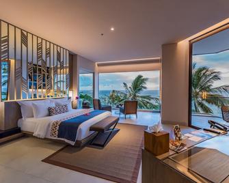 كاتاماران هوتل آند ريزورت - ماتارام - غرفة نوم