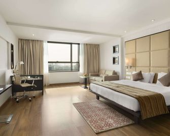 Ramada by Wyndham Navi Mumbai - Navi Mumbai - Schlafzimmer