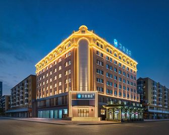 Harbin Baixiang Holiday Hotel Harbin East Station - Harbin - Edificio