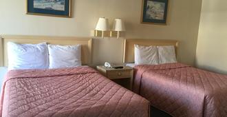 Coastal Motel - Jacksonville - Schlafzimmer