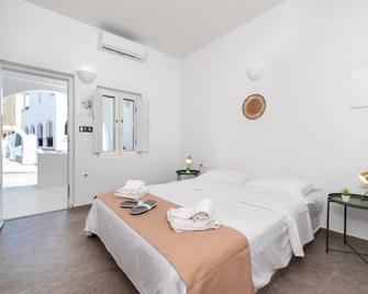 Thallos Cave House and Apartments - Karterados - Sypialnia