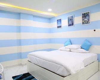 Hotel Spark - Pālakollu - Schlafzimmer
