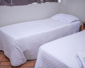 Comfort Suite 303 - Diamantina - Camera da letto