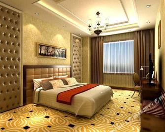Xinfuyuan Hotel - Yuncheng - Schlafzimmer