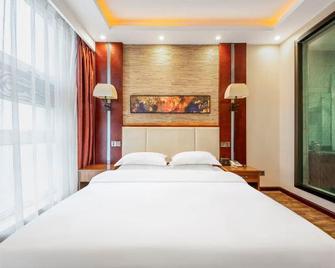 Luyuanchun Boutique Hotel (Jiaozuo University of Technology Shuangyong Theme Park) - Jiaozuo - Bedroom