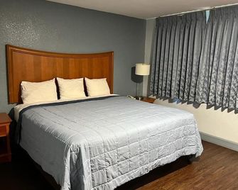 Holiday Motel - קלרקסוויל - חדר שינה