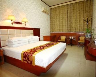 Guanghua Inn - Weinan - Bedroom